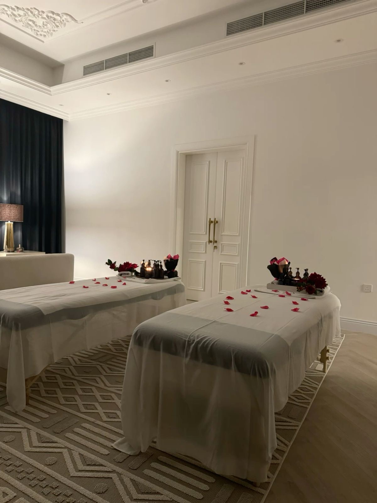 Couples massage suite with rose petals at ADE Lux Spa